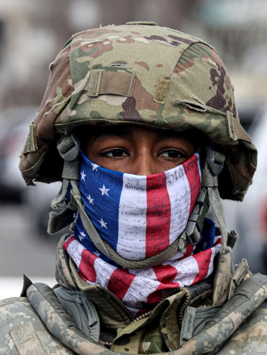 A member of the National Guard stands outside one of the entrances to the U.S. Capitol in Washington, D.C during the inauguration of Joe Biden as the nation's 467th President Jan. 20, 2021. 