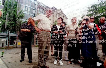 Educators from the United States gaze at a memorial to victims of the Holocaust who resided in this Berlin neighborhood.